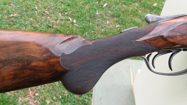 Intricate and perfectly executed checkering I would estimate at 28 LPI