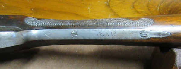Straight grip trigger guard with initials:  "F?C"